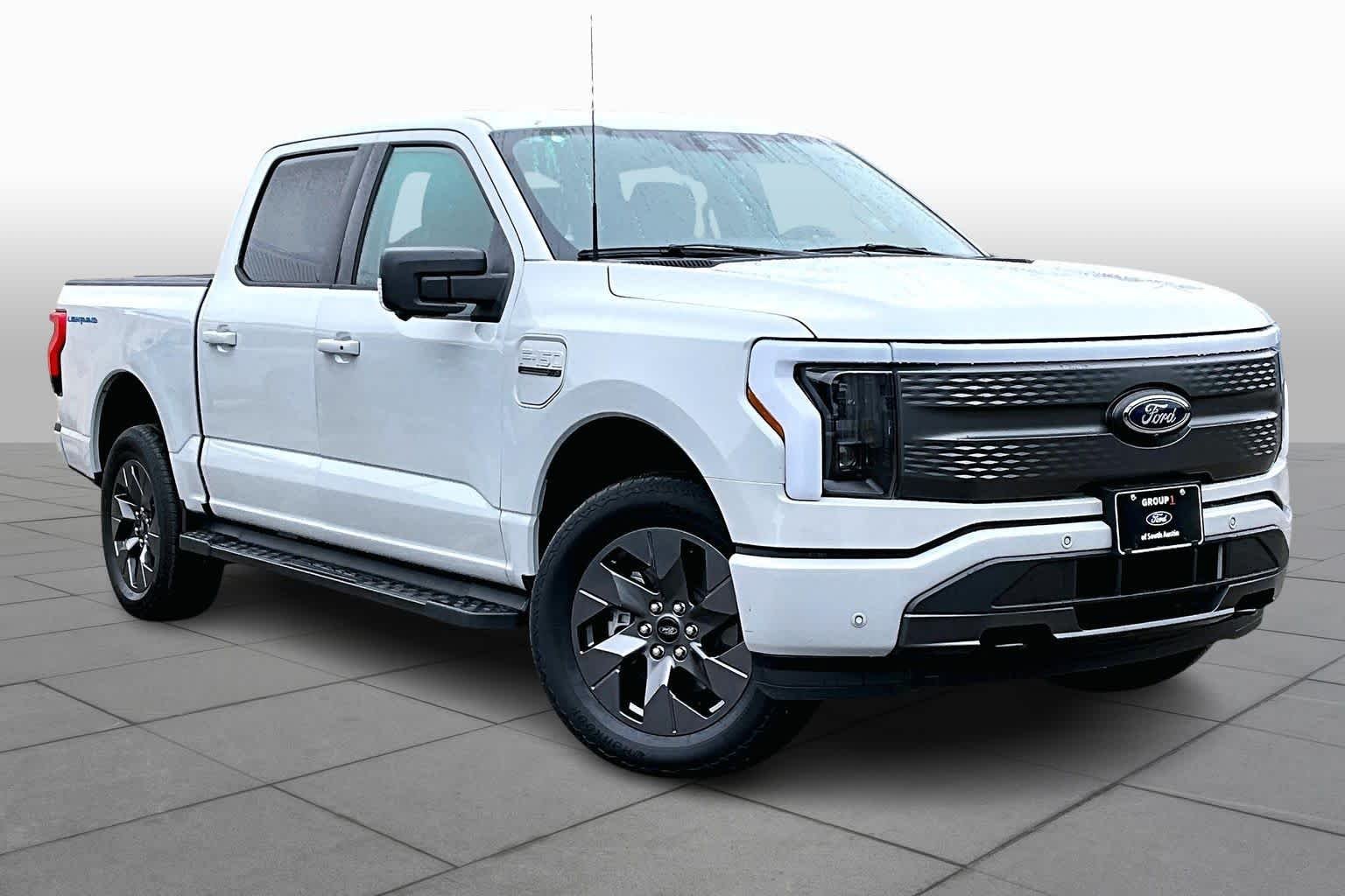 Used 2023 Ford F-150 Lightning XLT with VIN 1FTVW1EV2PWG36022 for sale in Austin, TX