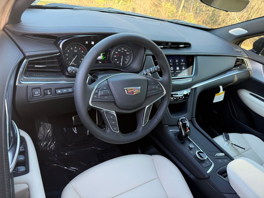 New 2026 Emerald Lake Metallic Cadillac Sport image 3