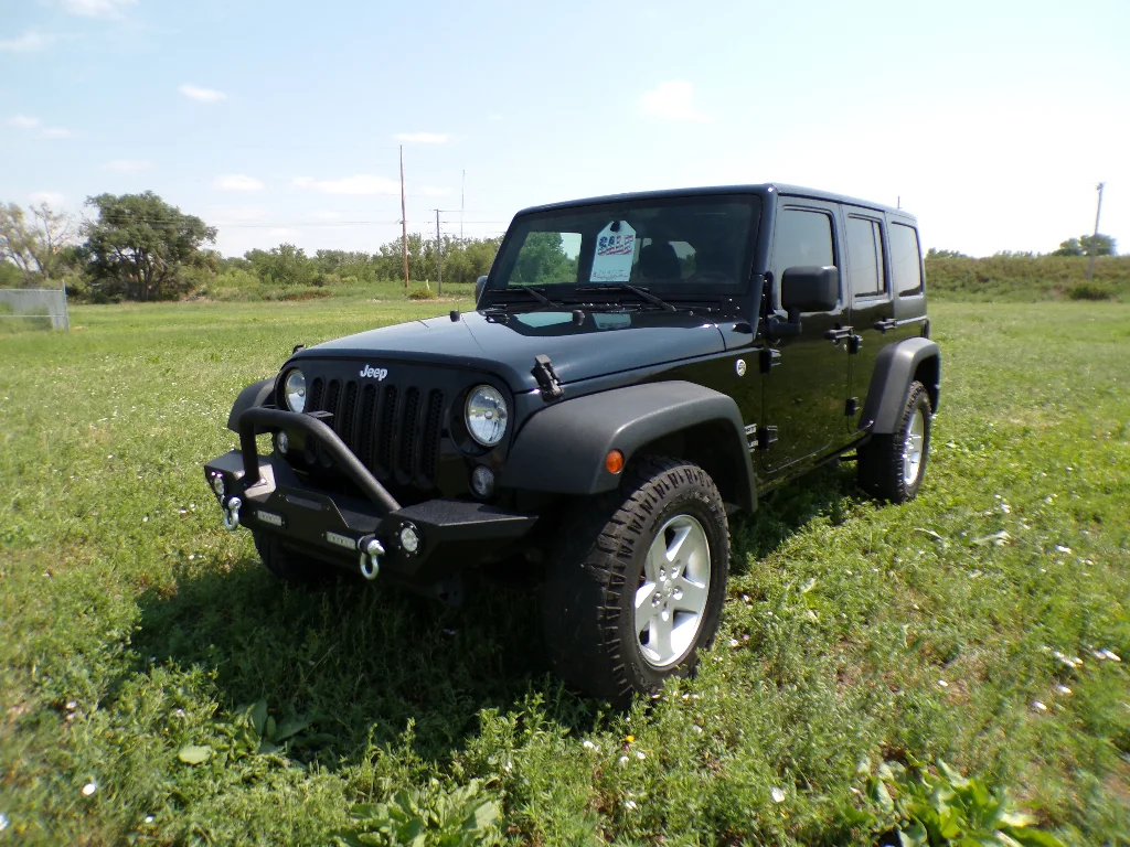 Used 2016 Black Clearcoat Jeep Sport image 1
