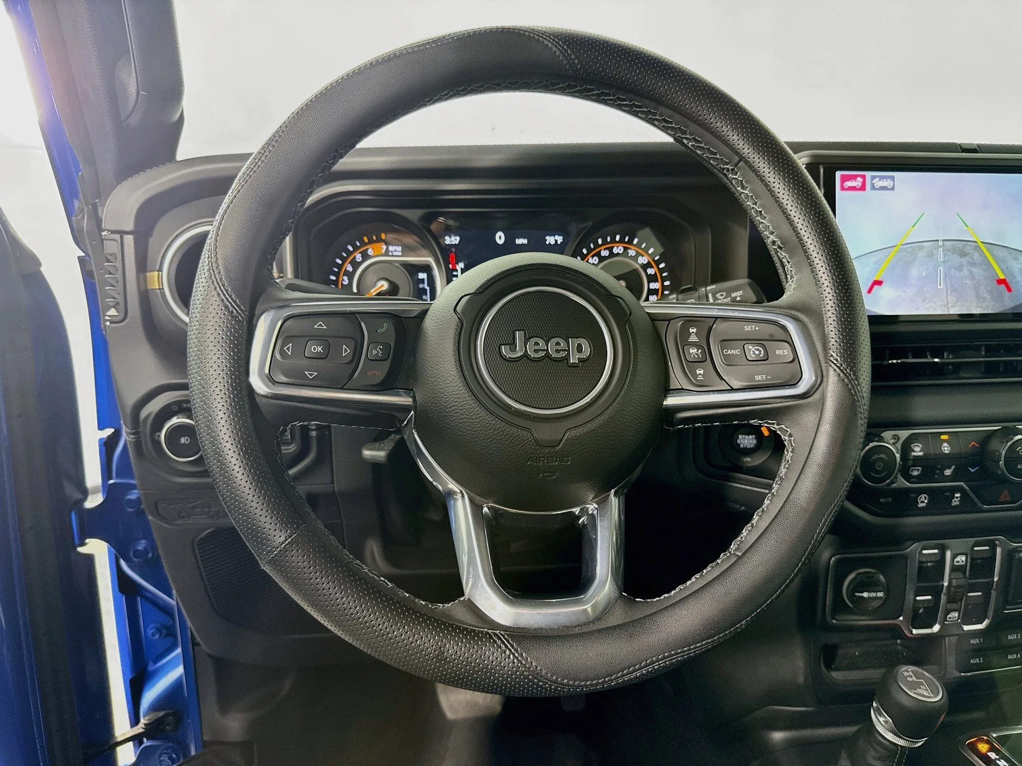 Used 2025 Hydro Blue Pearlcoat Jeep Sahara image 12