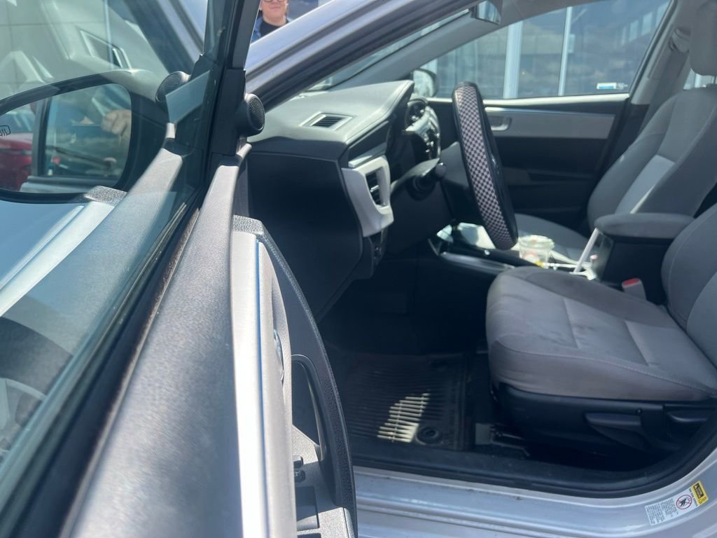 Used 2015 Classic Silver Metallic Toyota LE image 1