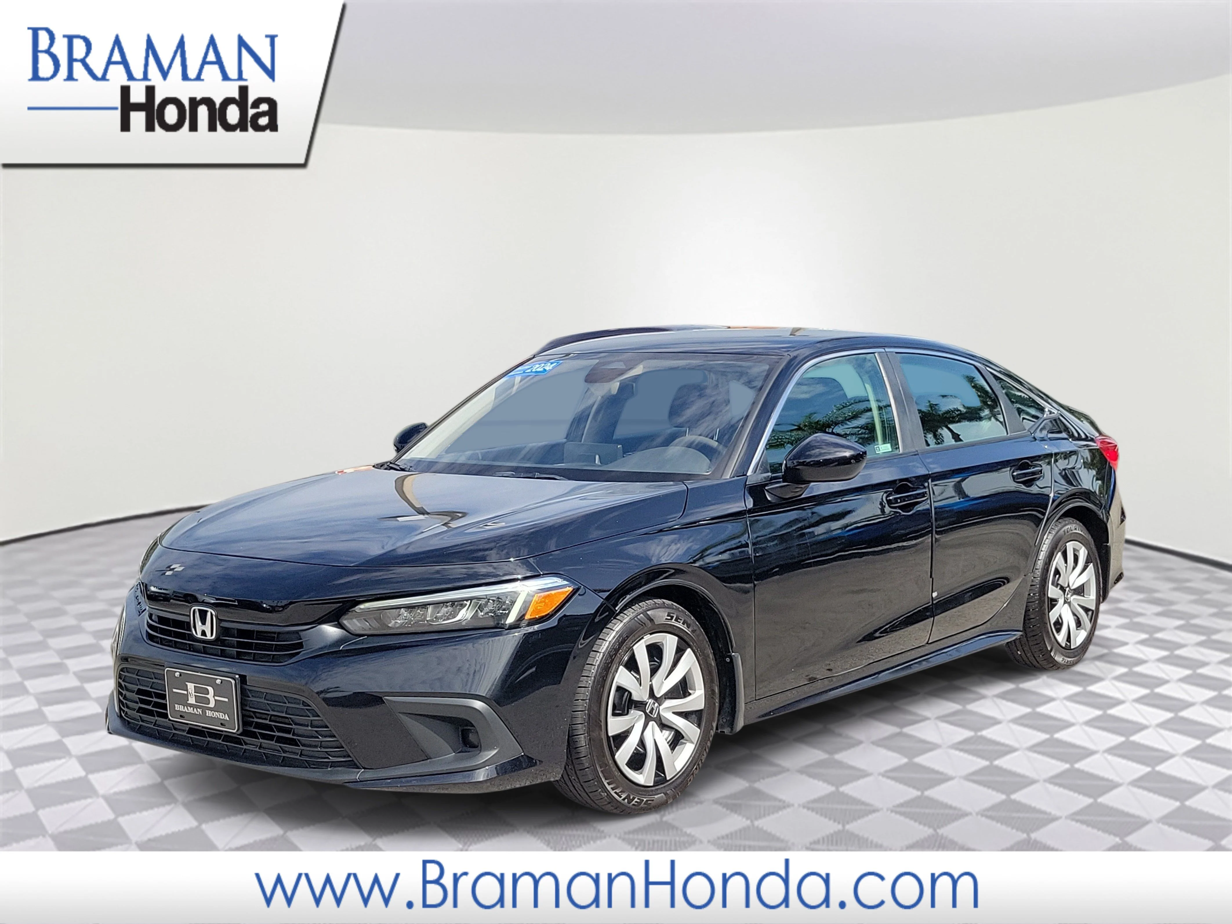 Certified Used 2024 Crystal Black Pearl Honda 2.0L 4D LX image 1