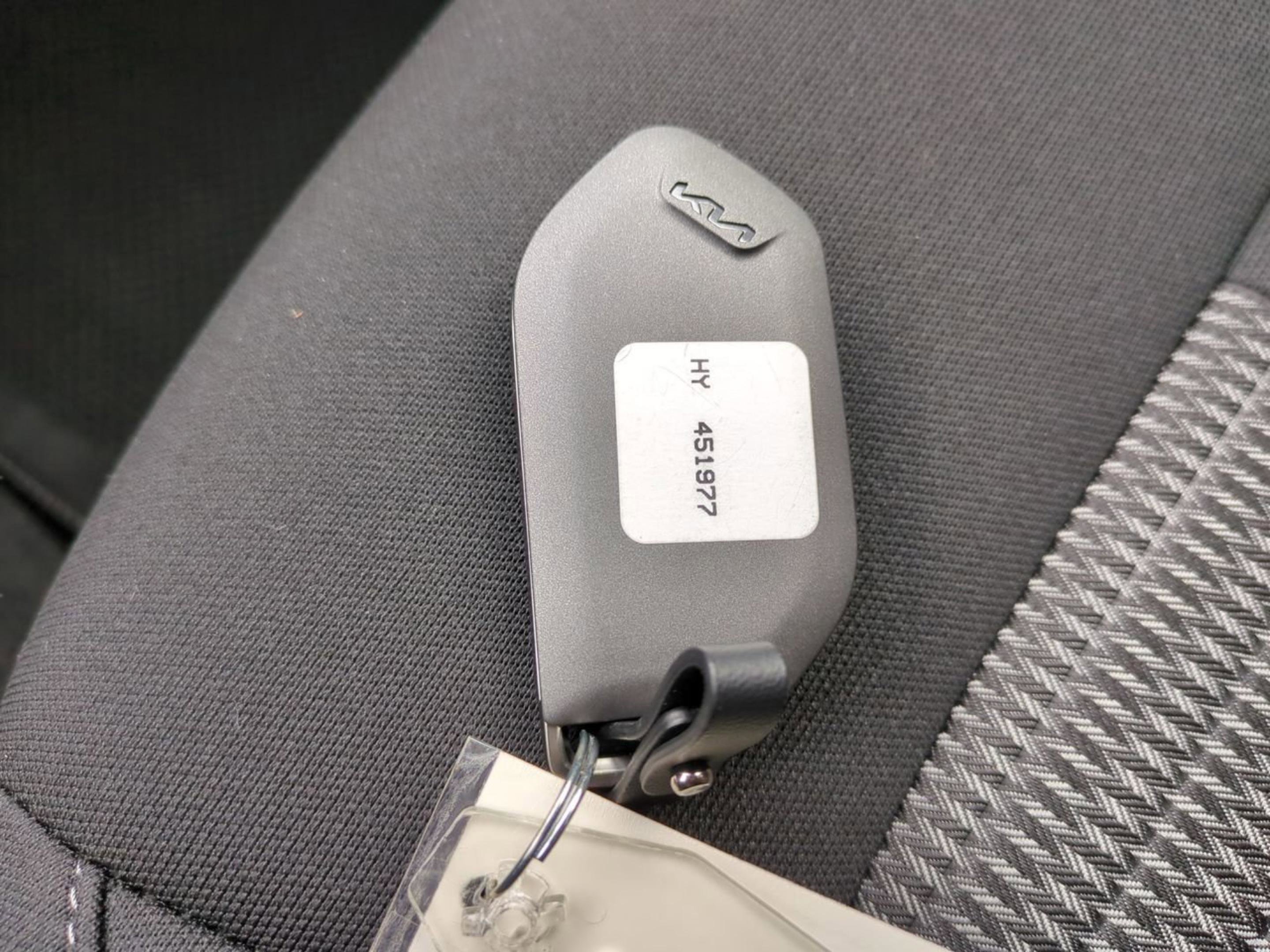 New 2026 Glacial White Pearl Kia LX image 25