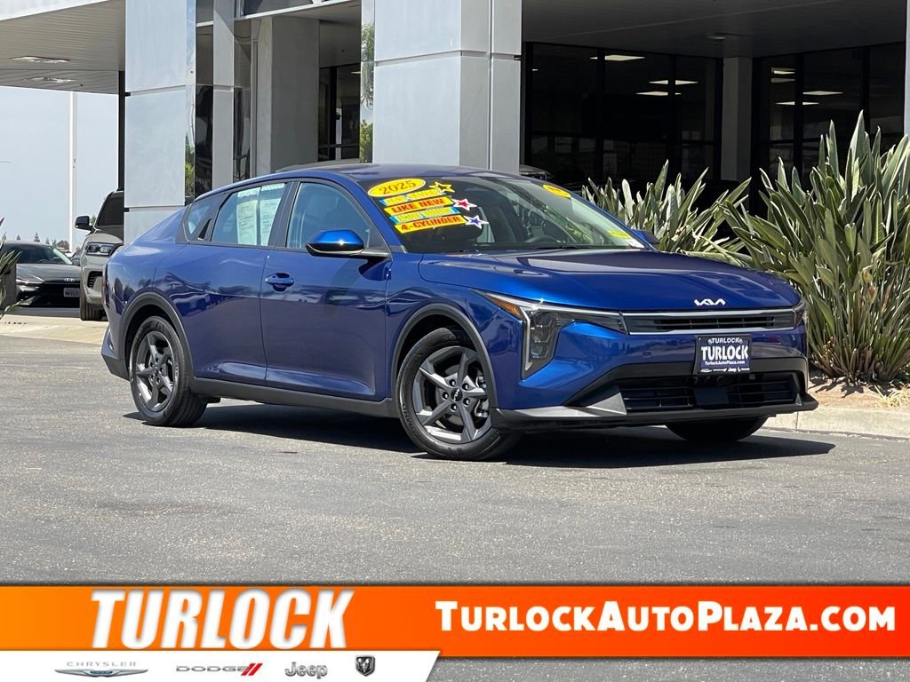 Used 2025 Blue Kia LXS image 1