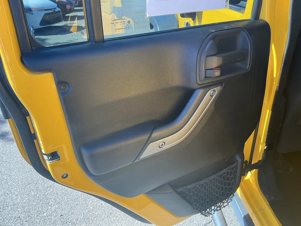 Used 2015 Baja Yellow Jeep Sport image 13