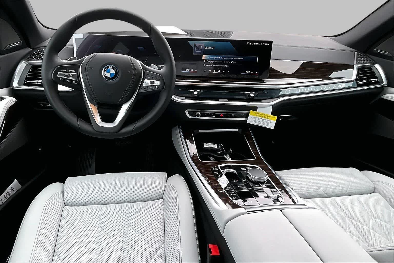 New 2026 Black Sapphire Metallic BMW xDrive50e image 5