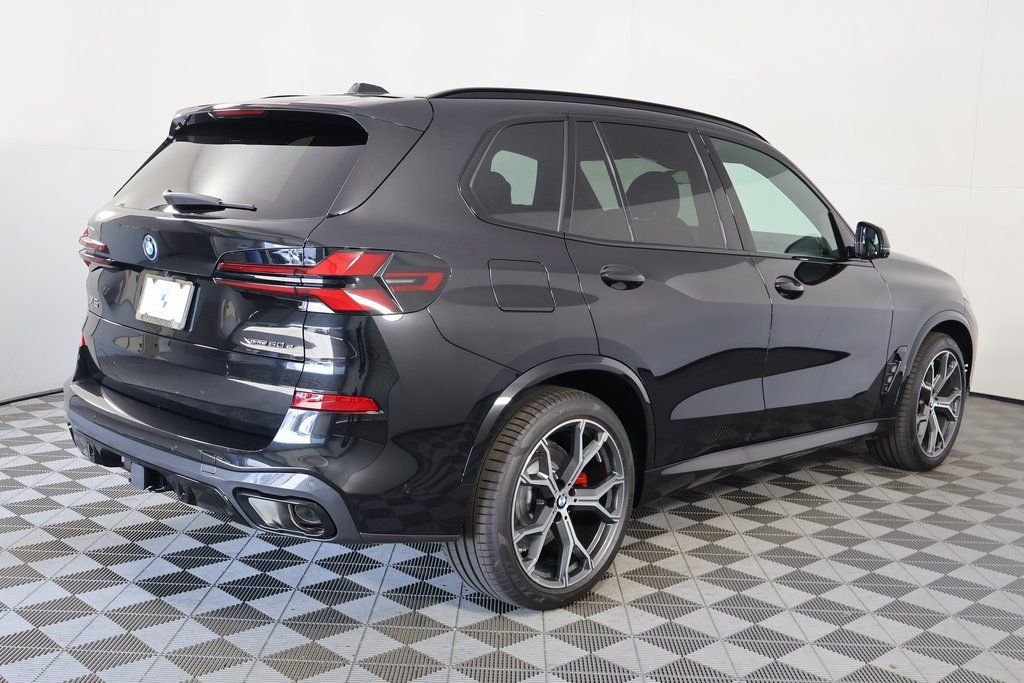 New 2026 Black Sapphire Metallic BMW xDrive50e image 2