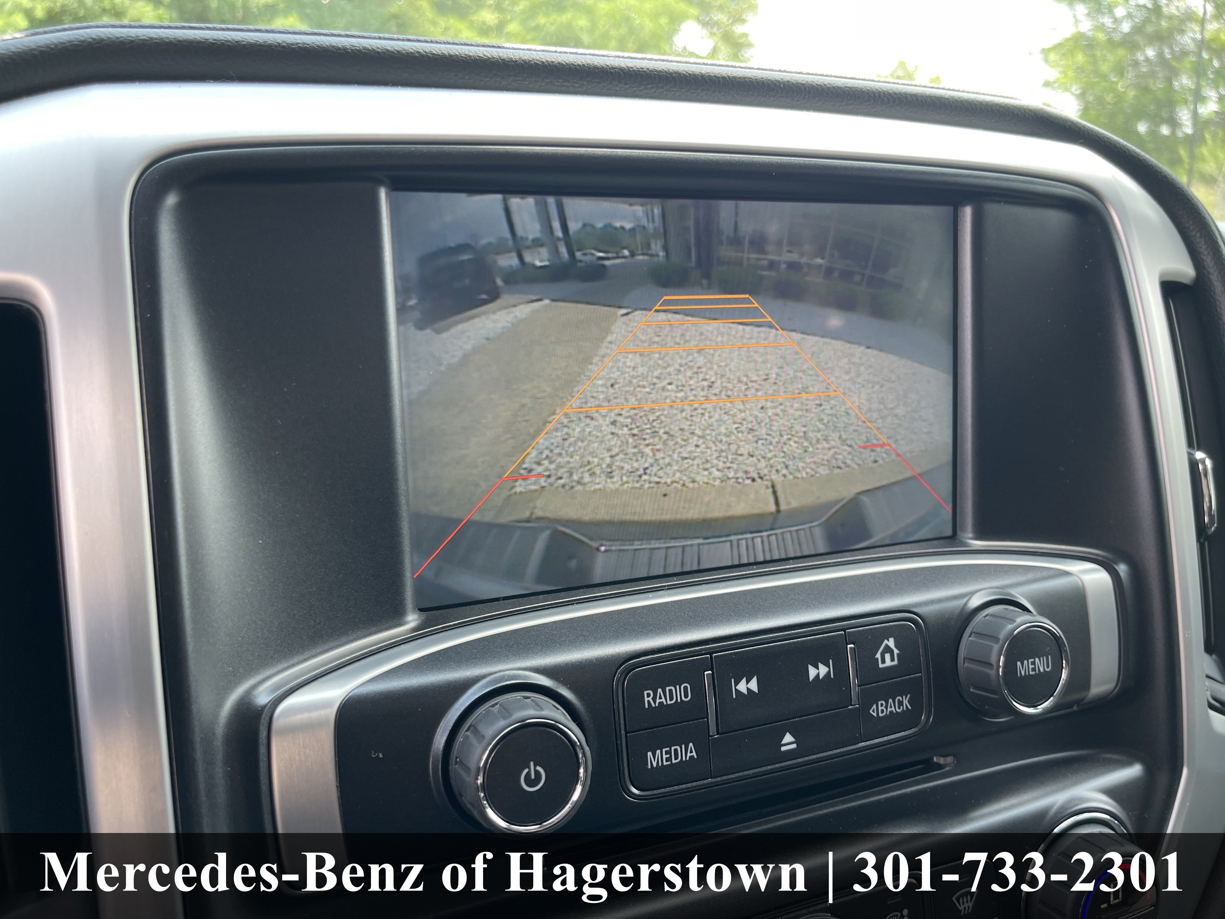 Used 2015 Quicksilver Metallic GMC SLE 4WD Crew Cab 153.0 image 12