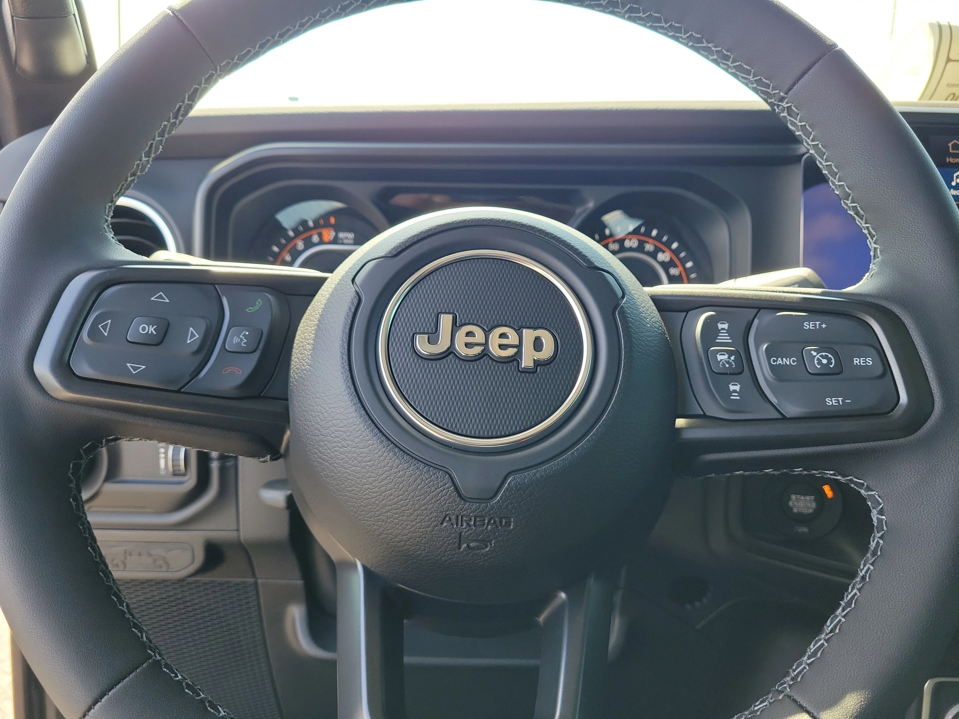 New 2026 Granite Crystal Metallic Clearcoat Jeep Sahara image 12