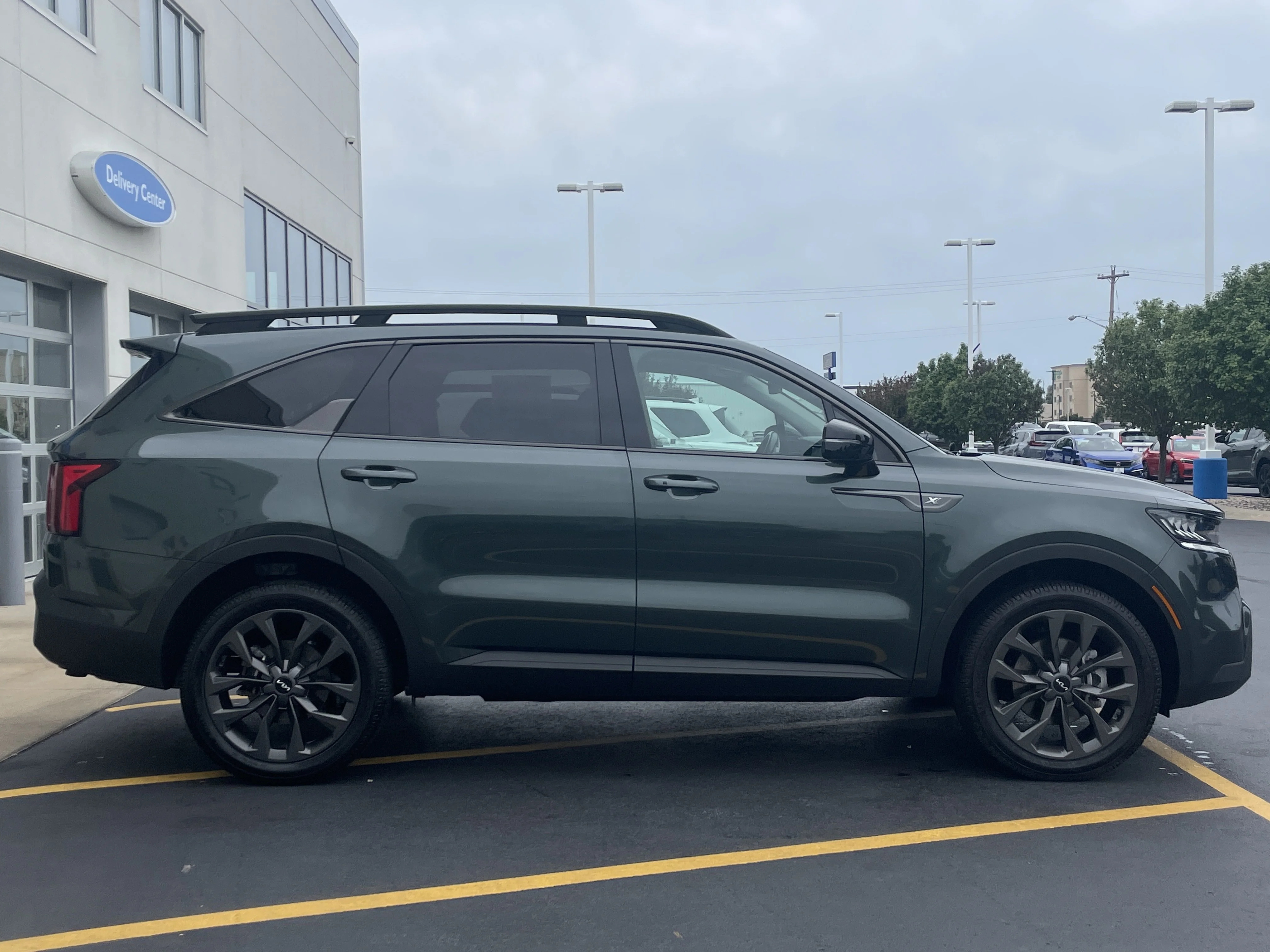 Used 2023 Aruba Green Kia X-Line EX image 1
