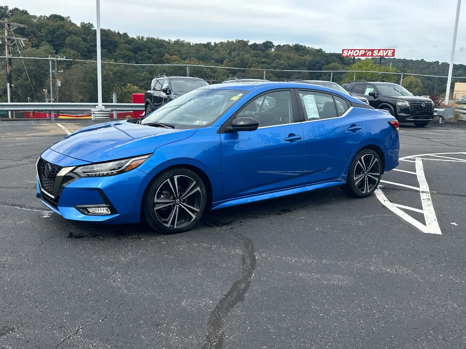 Certified Used 2023 Electric Blue Metallic Nissan SR image 3