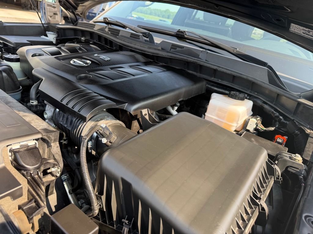 Certified Used 2024 Black Nissan Platinum image 9