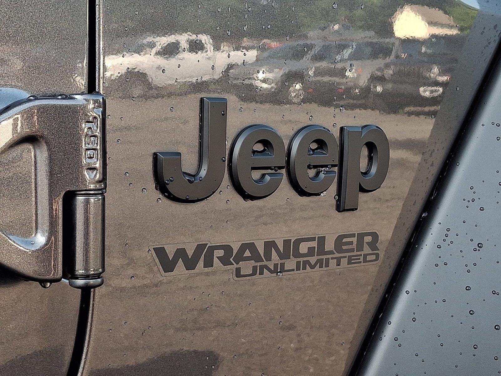 Used 2022 Granite Crystal Metallic Clearcoat Jeep Unlimited Sport image 29