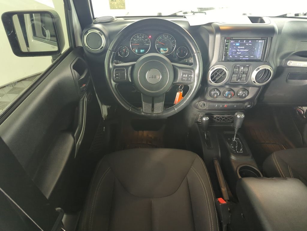 Used 2018 White Jeep Unlimited Sahara image 13