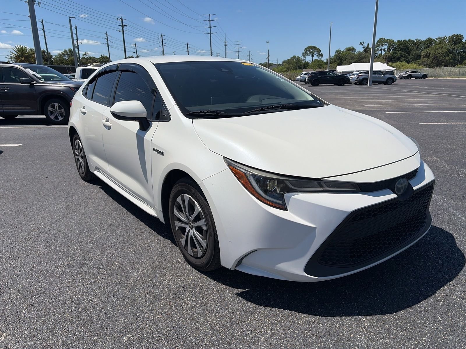 Used 2020 White Toyota LE image 1