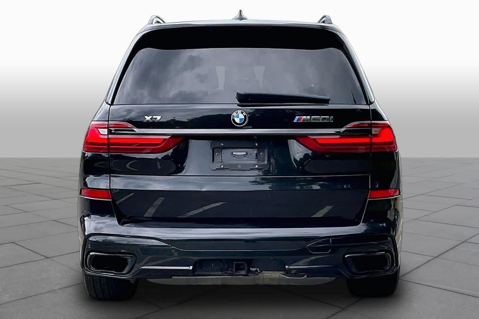 Used 2022 Black Sapphire Metallic BMW M50i image 4