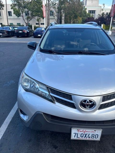 Used 2015 Classic Silver Metallic Toyota LE image 1