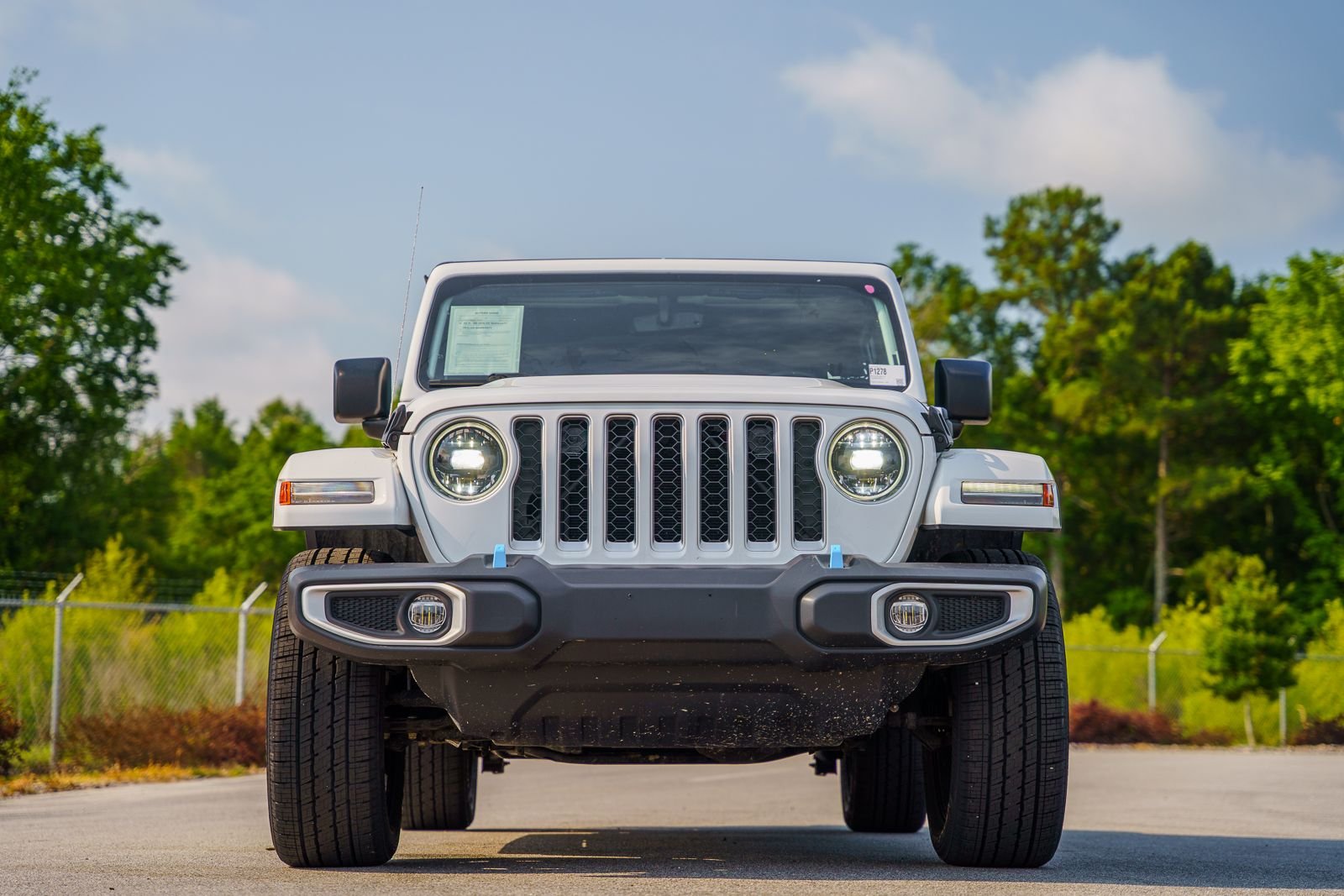 Used 2023 White Jeep Sahara 4xe image 1