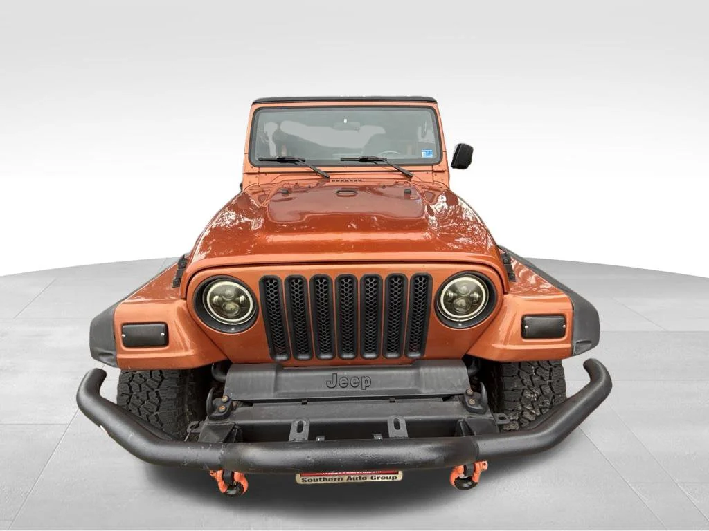 Used 2000 Orange Jeep Sport image 9