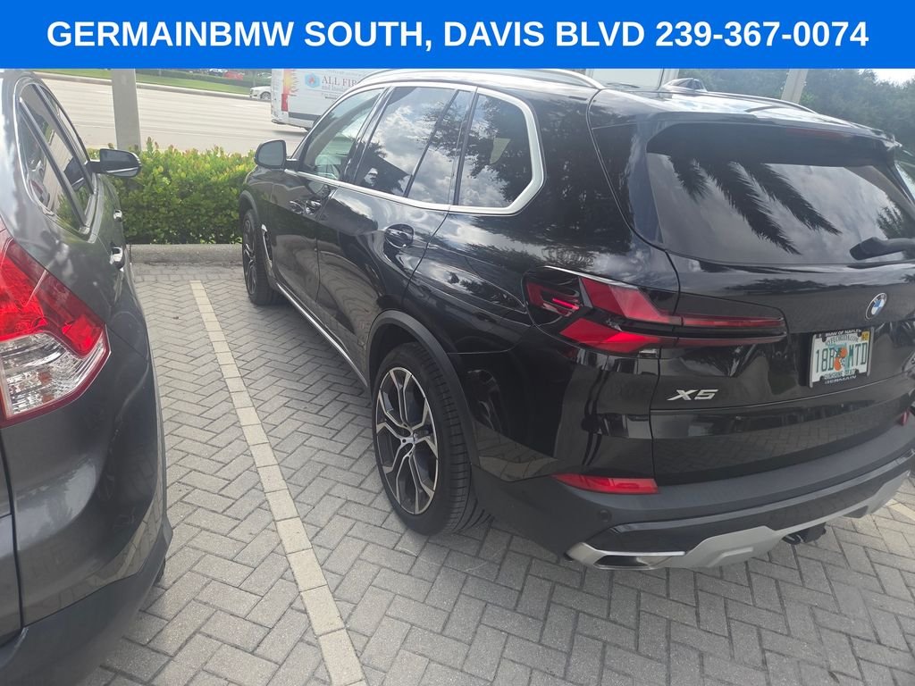 Certified Used 2024 Black Sapphire Metallic BMW sDrive40i image 4