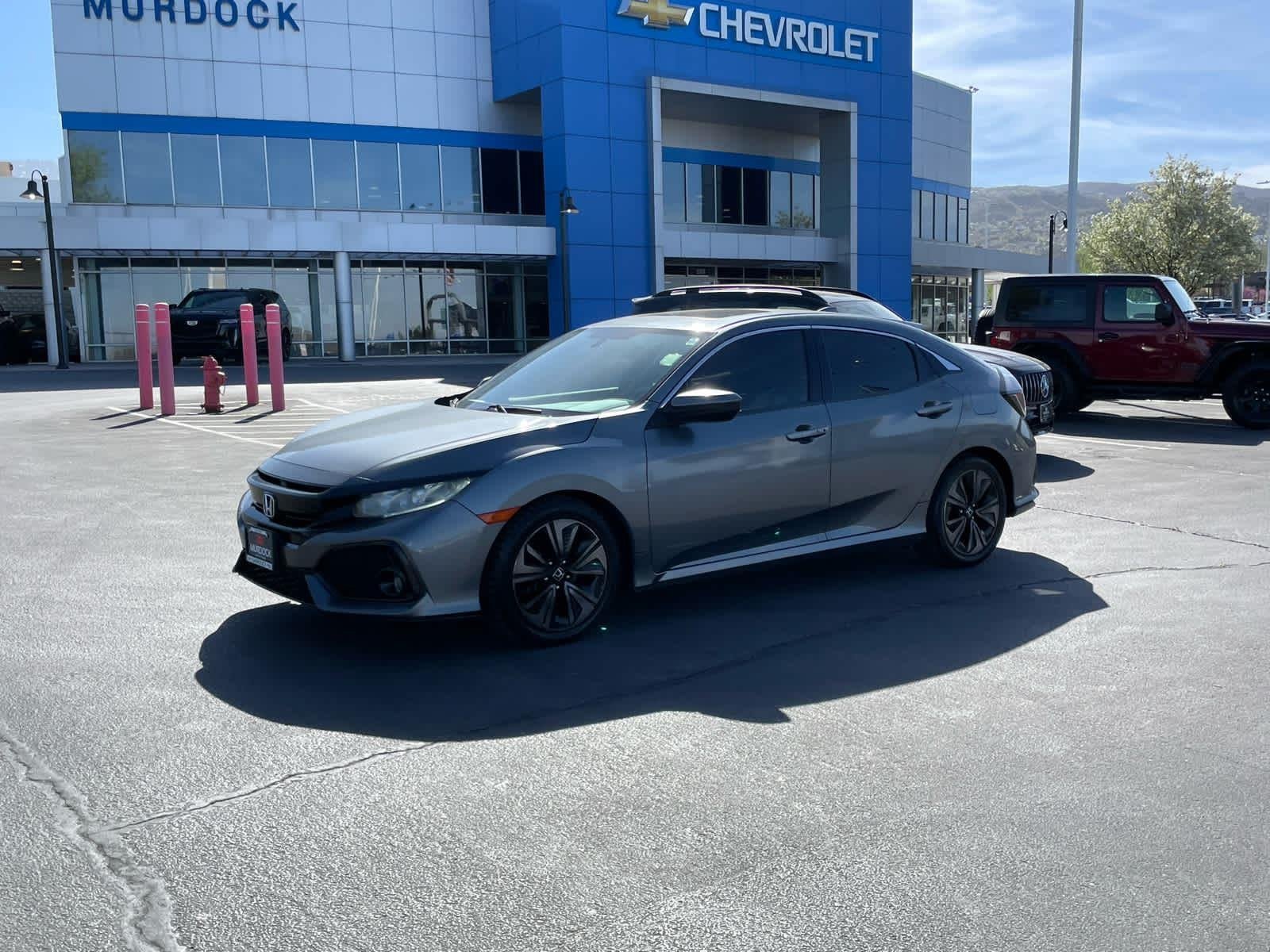Used 2018 Honda Civic Hatchback EX with VIN SHHFK7H57JU424452 for sale in Woods Cross, UT