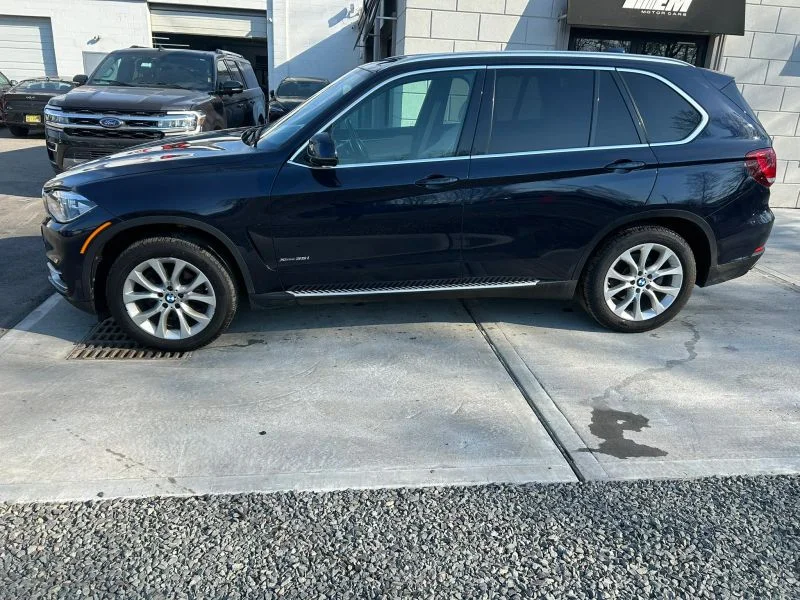Used 2018 Blue BMW xDrive35i Sport Utility 4D image 4