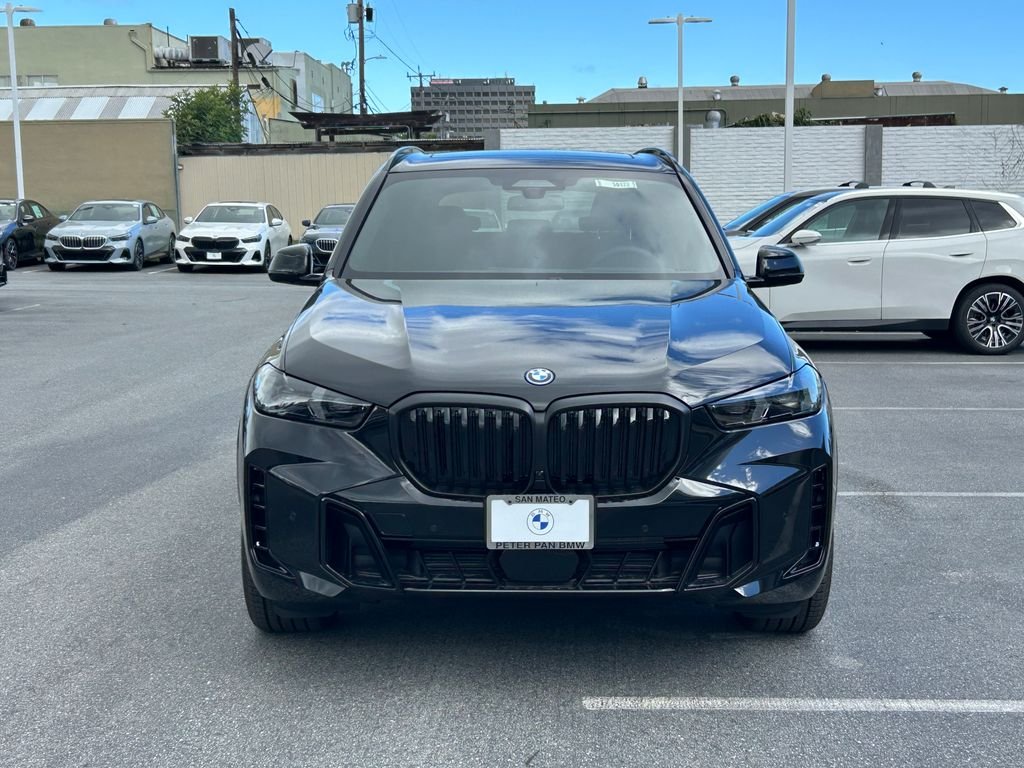 New 2026 Black Sapphire Metallic BMW xDrive50e image 8