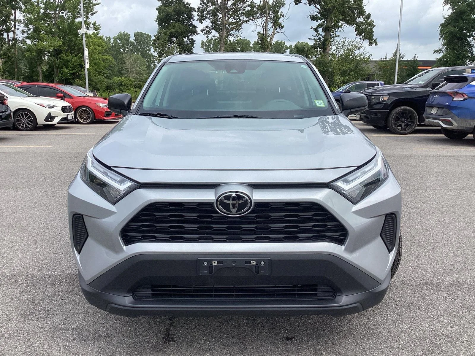 Used 2024 Silver Sky Metallic Toyota LE image 2