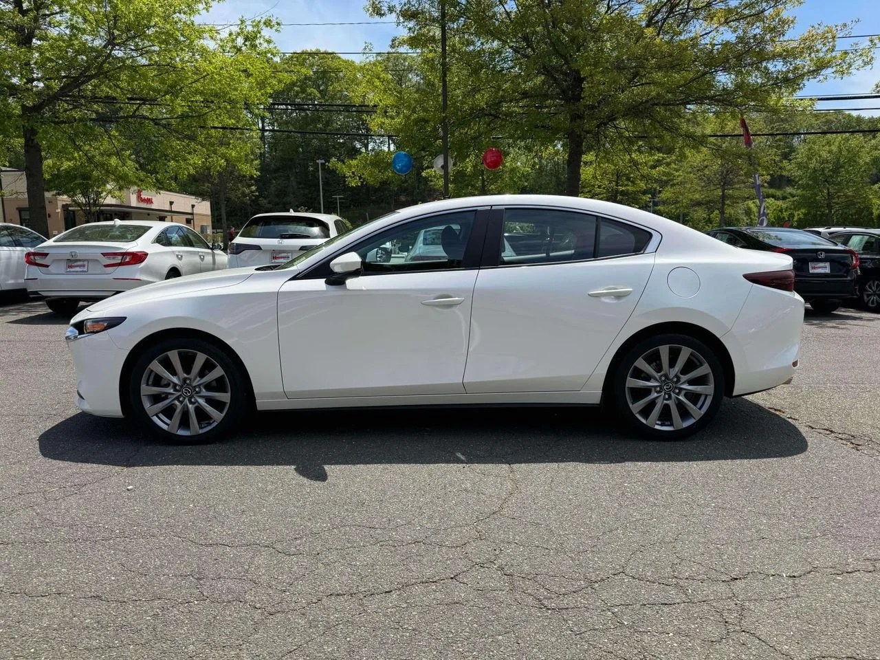 Used 2021 Snowflake White Pearl Mica Mazda Select image 4