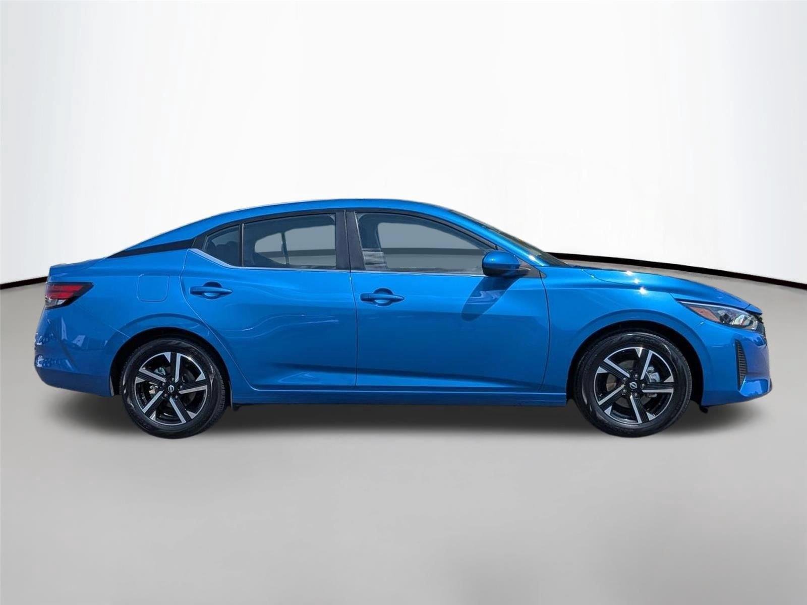 Used 2025 Electric Blue Metallic Nissan SV image 6