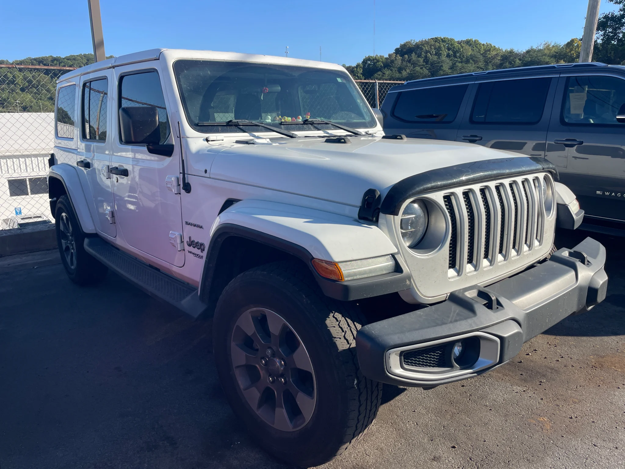 Used 2018 Bright White Clearcoat Jeep Sahara image 1