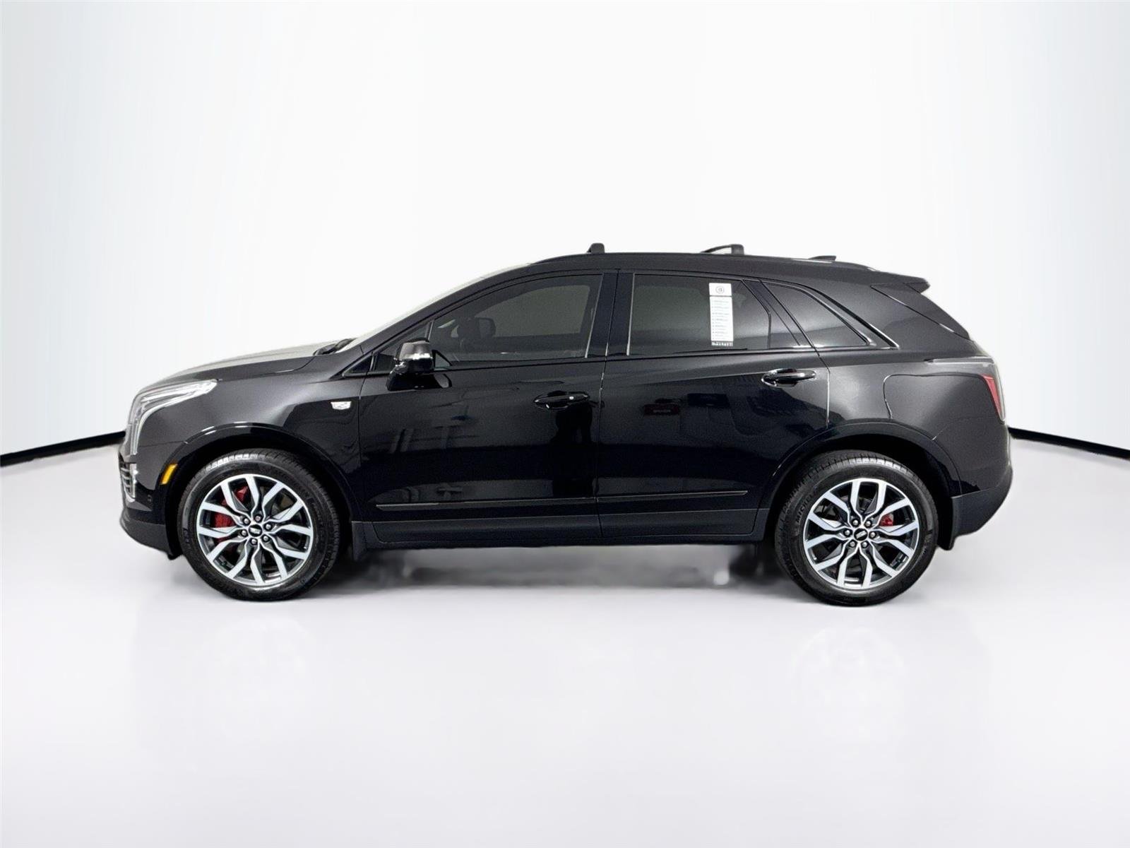 Used 2024 Stellar Black Metallic Cadillac AWD Sport image 14