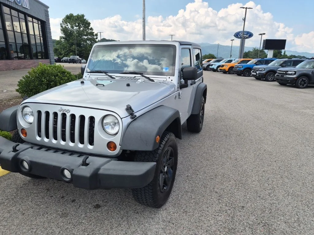 Used 2012 Bright Silver Metallic Jeep Sport image 2