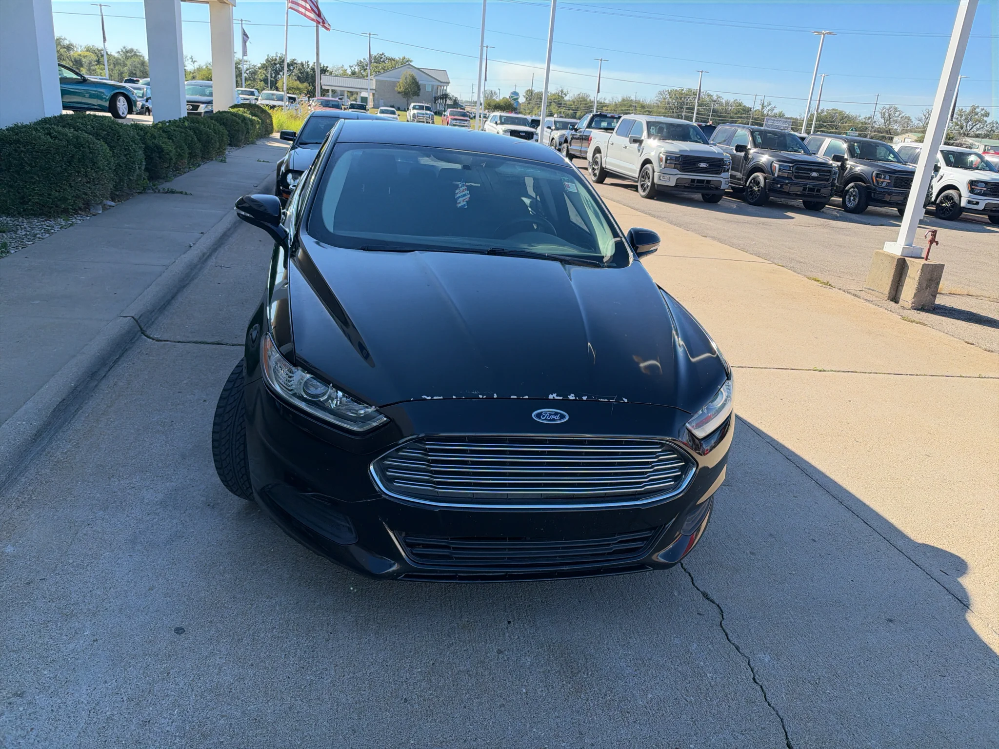 Used 2015 Ruby Red Tinted Clearcoat Ford SE image 3