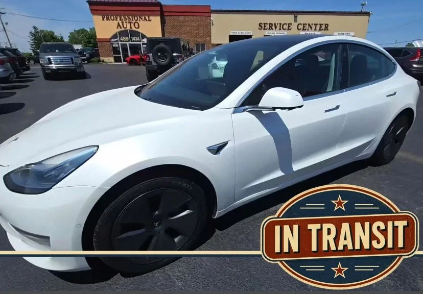 Used 2019 White Tesla Standard Range Plus image 1