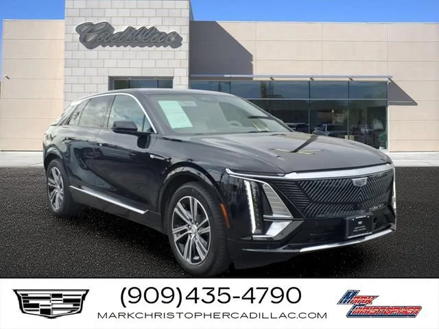 Used 2024 Stellar Black Metallic Cadillac Luxury 1 image 1