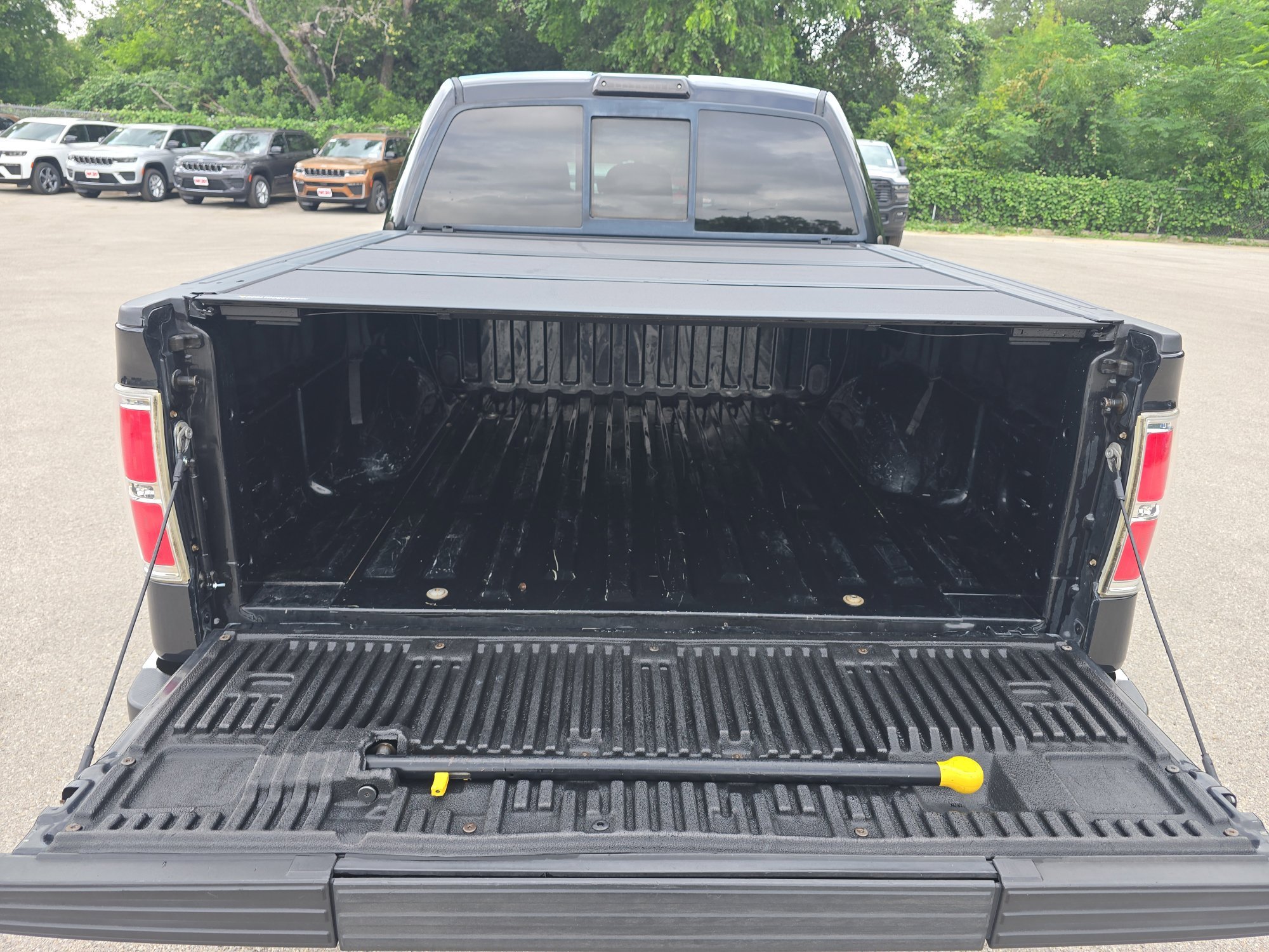 Used 2011 Tuxedo Black Metallic Ford Lariat image 12