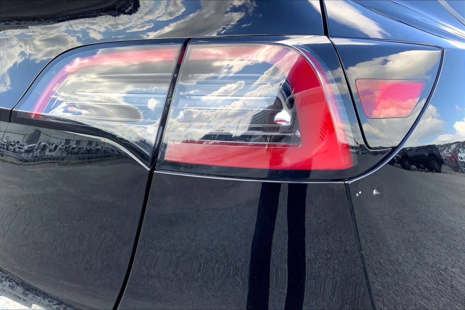 Used 2024 Solid Black Tesla  image 9