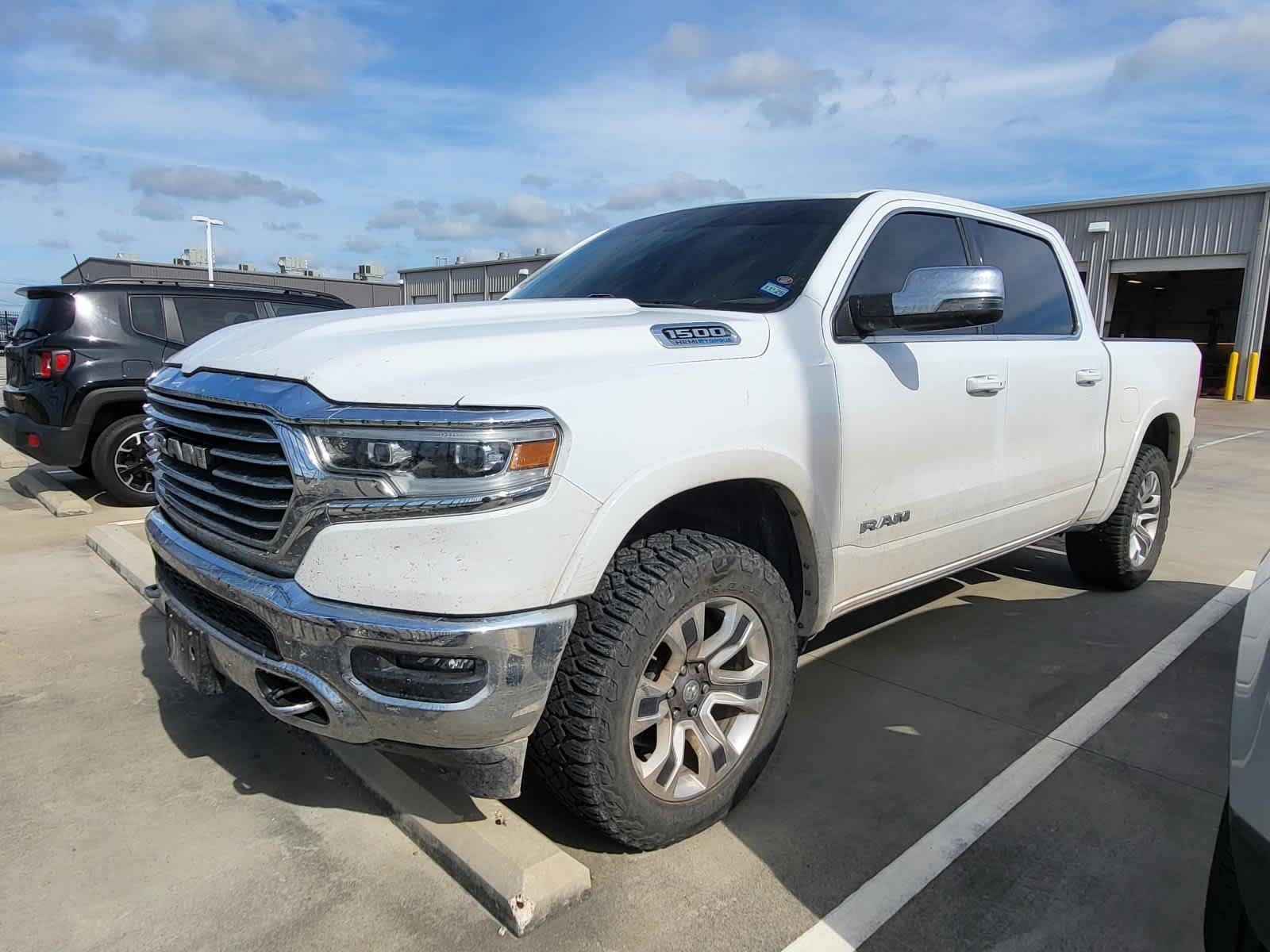 2023 RAM 1500 Longhorn 4x4 Crew Cab 5'7's photo