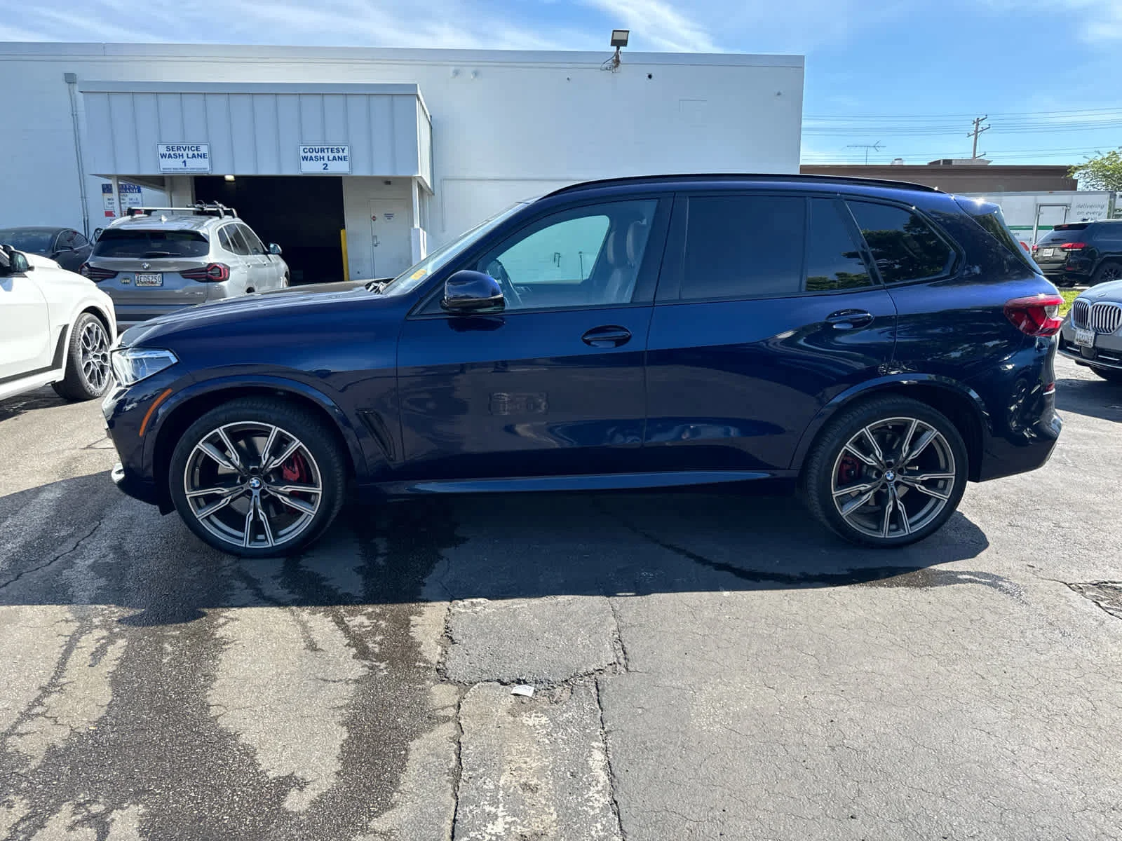 Used 2022 Tanzanite Blue II Metallic BMW M50i image 7