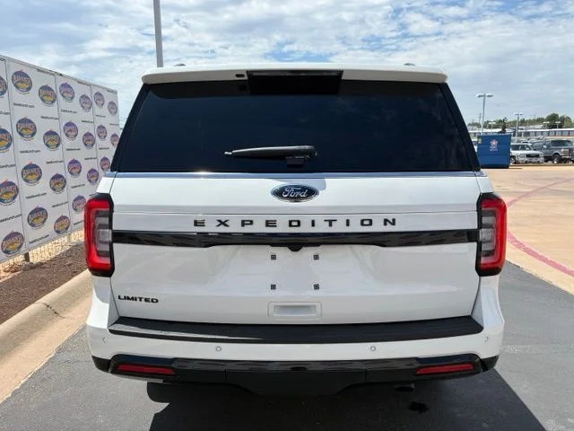 Used 2024 White Metallic Ford Limited image 5