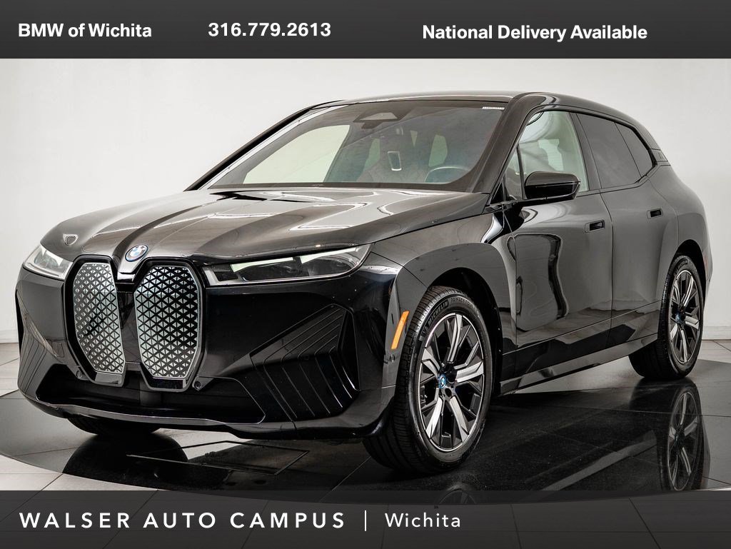 Used 2023 Black Sapphire Metallic BMW xDrive50 image 1