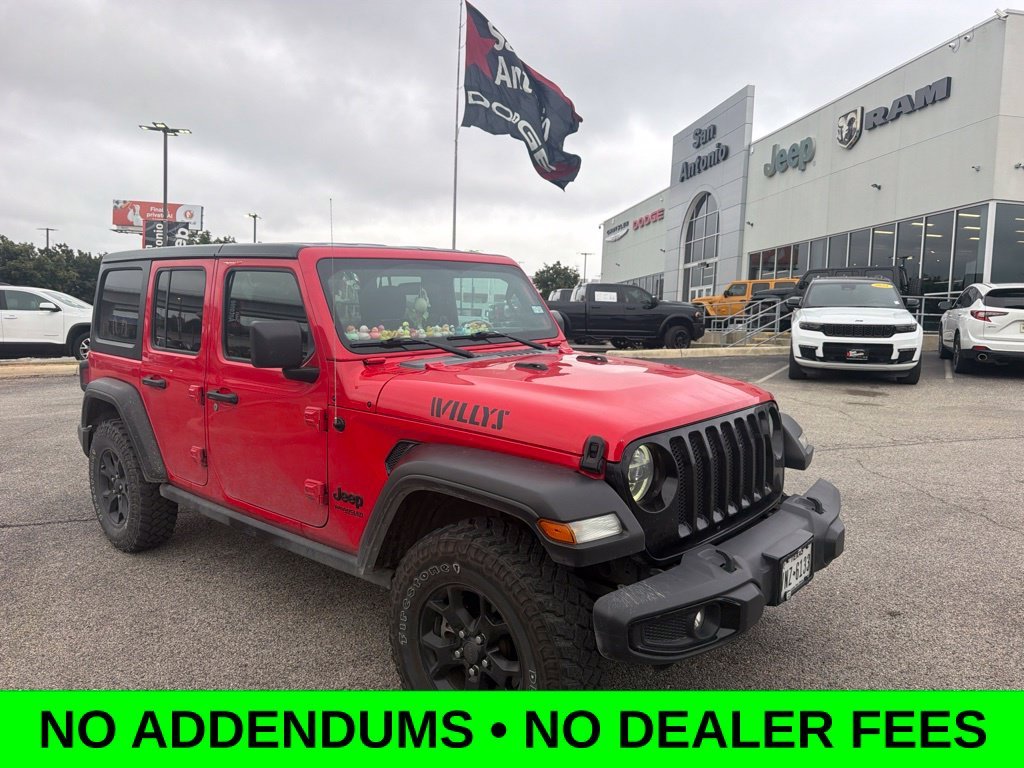 Used 2021 Red Jeep Unlimited Willys image 1