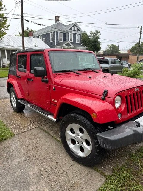 Used 2014 Red Jeep Unlimited Sahara image 28