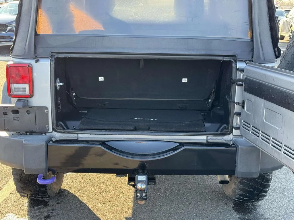 Used 2016 Billet Silver Metallic Clearcoat Jeep Sport image 29