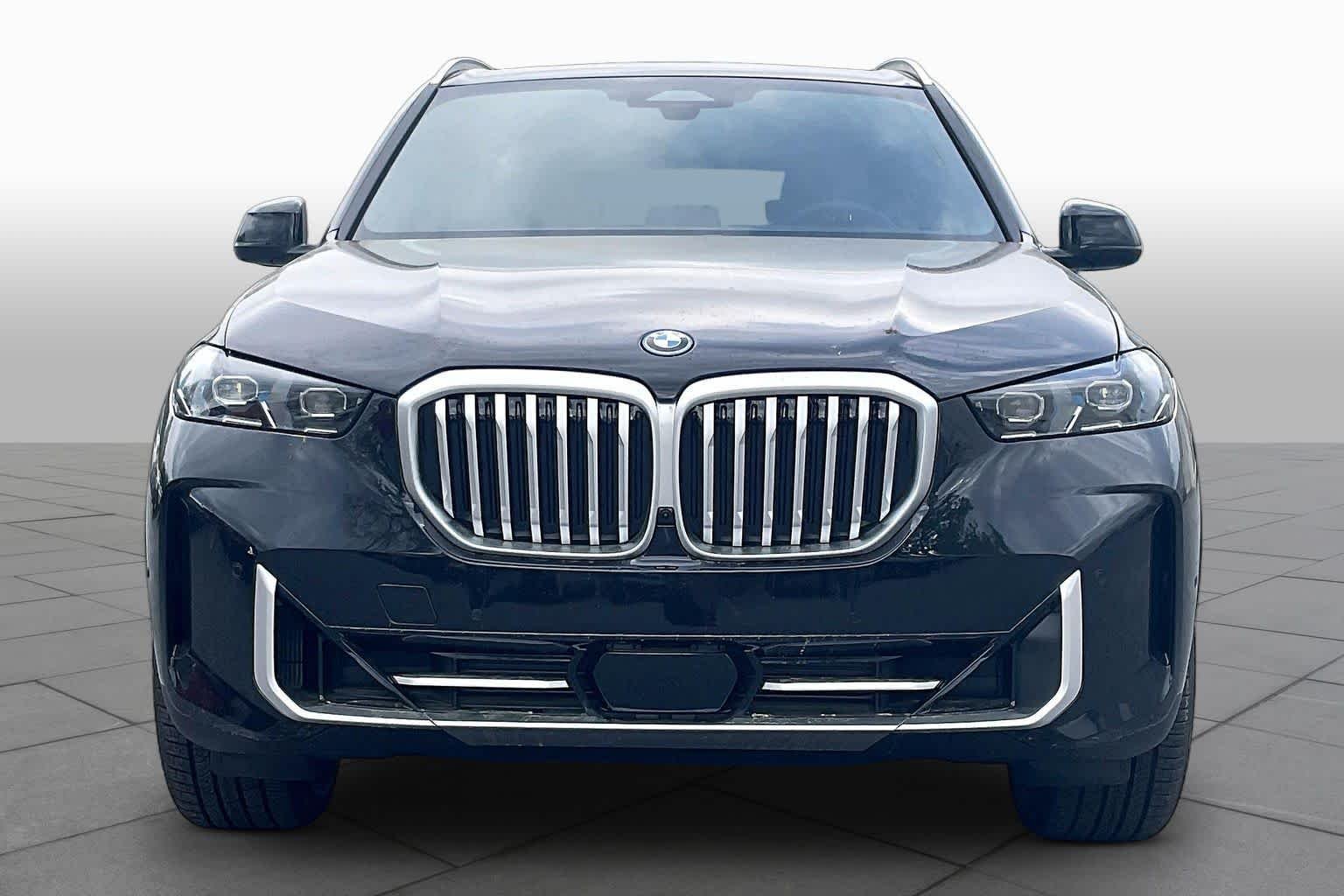 Used 2026 Black Sapphire Metallic BMW xDrive50e image 3