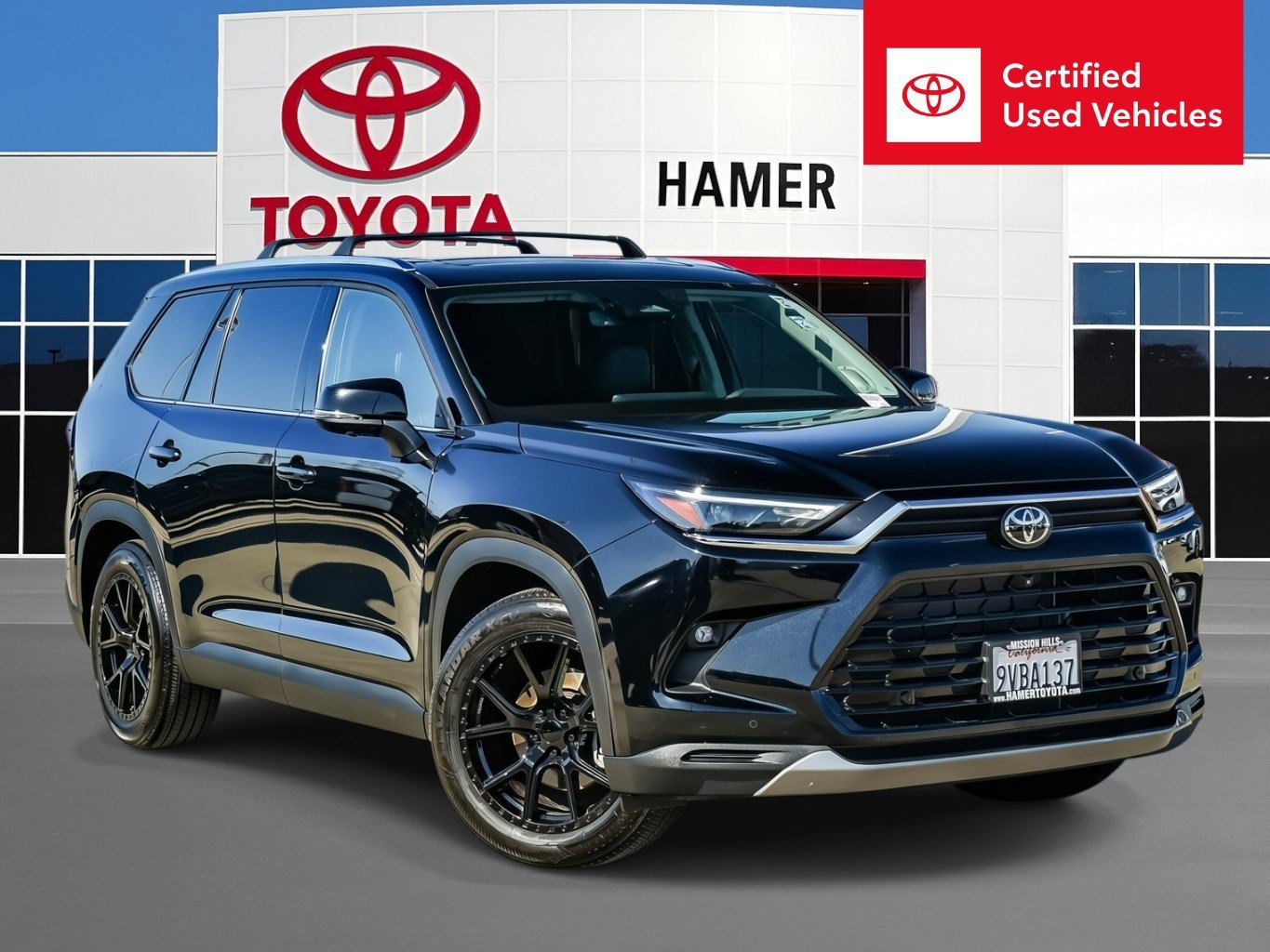 Certified Used 2025 Midnight Black Metallic Toyota Hybrid XLE image 1