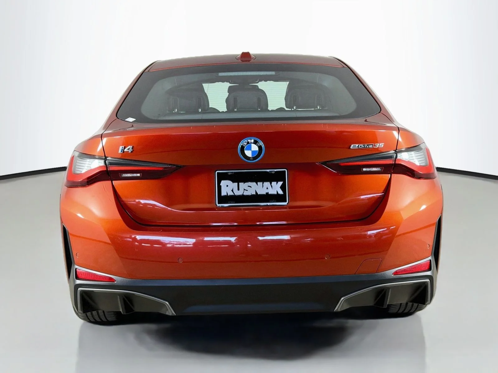 Certified Used 2024 Sunset Orange Metallic BMW eDrive35 image 6