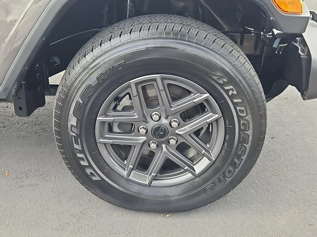 Used 2024 Granite Crystal Metallic Clearcoat Jeep Sport S image 30