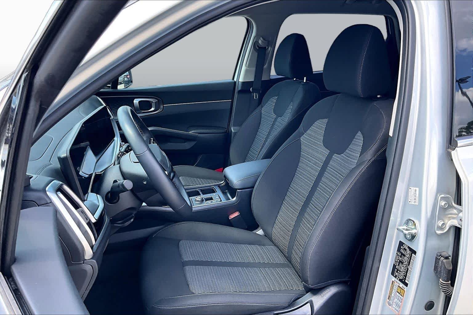 New 2026 Ivory Silver Kia LX image 8